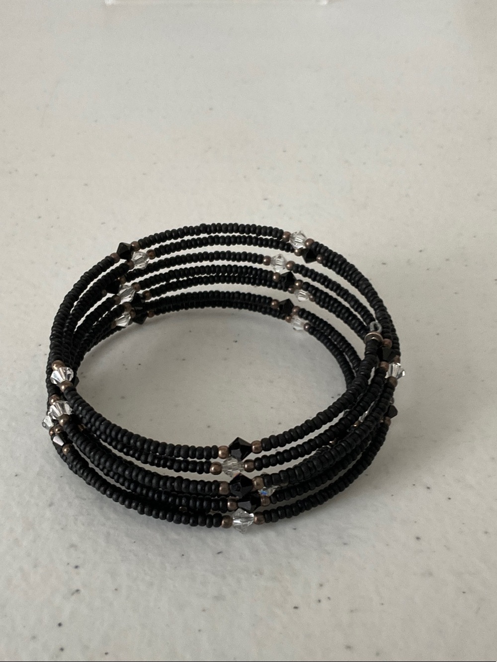 Black Beaded Wrap around Coil Bracelet with Silver Accents